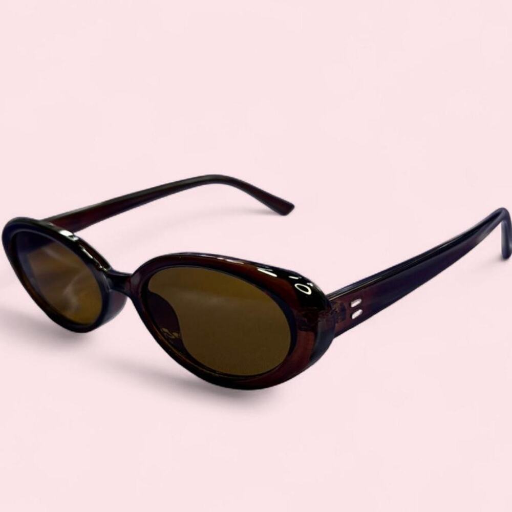 brown translucent oval sunglasses with brown lens y2k euro summer 90s coastal